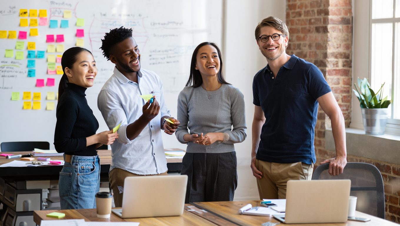 4 sales people discussing how to handle gatekeepers in sales